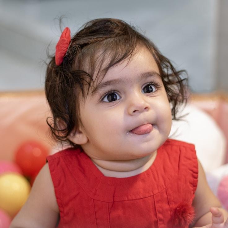Alex Rivera, Lead Design Curator at ParkPlainStudio, reviewing corporate floral arrangements